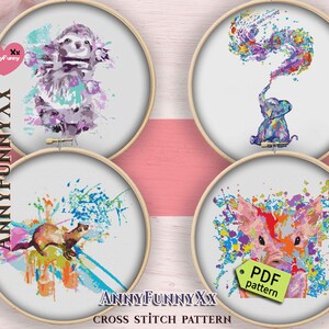 May include: Four cross stitch patterns featuring watercolor-style animals. The patterns include a sloth, an elephant, a ferret, and a pig. Each animal is surrounded by colorful paint splatters.