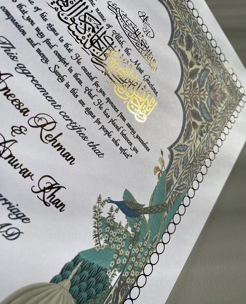 May include: A white wedding certificate with gold calligraphy and a peacock illustration. The text reads "The name of Allah, the Most Gracious, ... are signs for people who reflect." This agreement certifies that Aneesa Rehman & Anwar Khan.