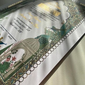 May include: A wedding invitation with a gold border and intricate floral designs. The text reads "were united in marriage in February 2024 AD corresponding to Rajab 1445 AH".