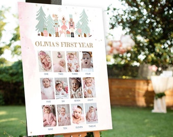 May include: A white poster board with a pink and white watercolor background. The poster board has a title that reads "Olivia's First Year". There are 12 photos of a baby girl in a grid format, each photo labeled with a number from one to twelve.