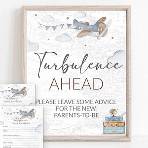 May include: A printable baby shower advice card with a blue and brown airplane flying over a map with clouds and stars. The text reads "Turbulence Ahead" and "Please leave some advice for the new parents-to-be".