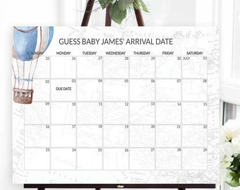 May include: A white calendar with a watercolor hot air balloon design. The calendar is for guessing the arrival date of a baby named James. The due date is marked on the calendar.