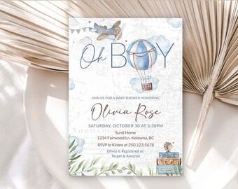 May include: A baby shower invitation with a blue and white hot air balloon, a small airplane, and the text "Oh Boy" in blue script. The invitation is for Olivia Rose and includes the date, time, and location of the shower. It also includes the RSVP information and where Olivia is registered.