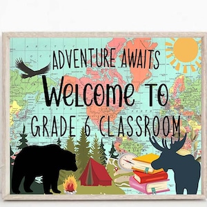 May include: A classroom welcome sign with a world map background. The sign says "Adventure Awaits Welcome to Grade 6 Classroom". There are illustrations of a bear, a moose, a tent, a compass, and a stack of books.