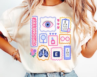 Cute Optometry Sweatshirt with Eye Exam Icons, Pastel Pink Vision Care Crewneck, Optometrist Gift for Eye Doctors and Students Sweatshirt