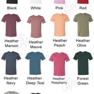 May include: Color chart showing 12 different t-shirt colors. The colors are: black, white, pink, red, heather maroon, heather mauve, heather peach, heather olive, heather navy, heather deep teal, heather raspberry, forest green, athletic heather, and dark grey heather.