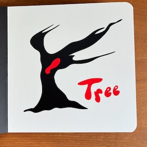May include: A black tree silhouette with a red accent and the word "Tree" in red on a white background. The image is on a white card with rounded corners.