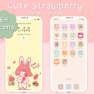 May include: A phone screen with a pink and yellow background and a grid of 64 icons. The icons are all different colors and shapes, and they represent different apps. The phone screen also has a clock that says 1:44 and a date that says Tuesday, 14 June. The phone screen also has a cute cartoon strawberry character with bunny ears holding a strawberry.