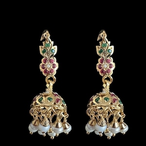 May include: A pair of gold earrings with red and green gemstones. The earrings have a bell-shaped design with pearl drops.
