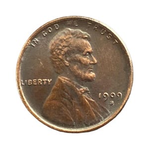 May include: A copper-colored United States one-cent coin featuring the profile of Abraham Lincoln facing right. The text IN GOD WE TRUST is arched at the top, LIBERTY is on the left, and the year 1909 with an S mint mark is on the right.