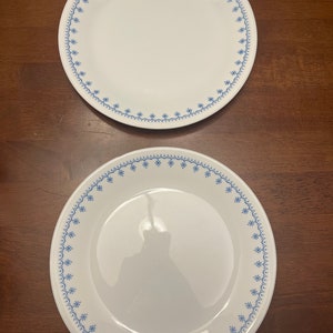 Set of two vintage Corelle snowflake plates