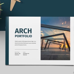 May include: A white and blue architectural portfolio cover with the text "ARCH PORTFOLIO" in bold, dark blue letters. The cover also includes a photo of a modern structure with a geometric design against a sunset sky.