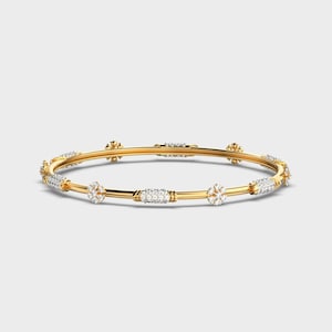 May include: A gold bangle bracelet with diamond embellishments. The bracelet has sections of small diamonds and floral diamond clusters. The bangle is a circular design. The bracelet is suitable for everyday wear.