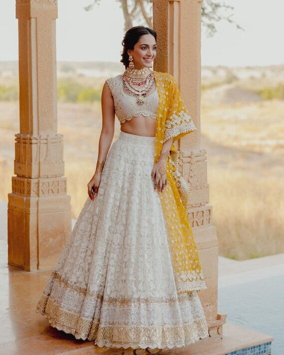 White Georgette Lehenga Choli and Soft Net Dupatta With Embroidery