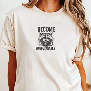 Rebellious Raccoon Graphic Tee - Become Ungovernable Shirt