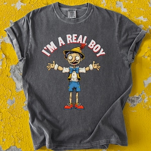 Shirt Pinokkio I'm A Real Boy - grappige cartoon Pinokkio T-shirt, sprookjeshirt, houten jongenscadeau, T-shirt karakter T-shirt meme
