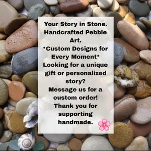 May include: A collection of smooth, multi-colored river pebbles surrounding a central white rectangular sign with black text that reads: Your Story in Stone. Handcrafted Pebble Art. *Custom Designs for Every Moment* Looking for a unique gift or personalized story? Message us for a custom order! Thank you for supporting handmade. A small pink flower icon is at the bottom right.