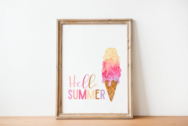 May include: A framed print with a watercolor illustration of a melting ice cream cone with three scoops in shades of pink, yellow, and purple. The text "Hello Summer" is written in pink and orange letters.