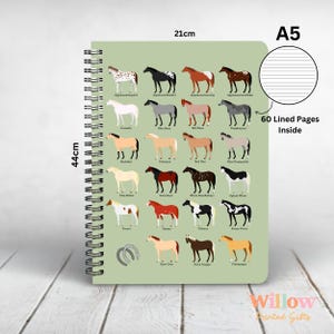 May include: A green A5 notebook with 60 lined pages. The cover features illustrations of 24 different horse breeds with their names. The notebook measures 21 cm by 44 cm.