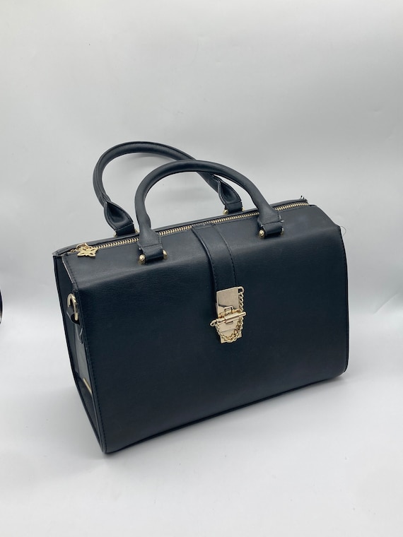 BCBGMAXAZRIA Woemns Handbags | Beverly Padded Braided Leather Clutch Bone |  Redcar Blog