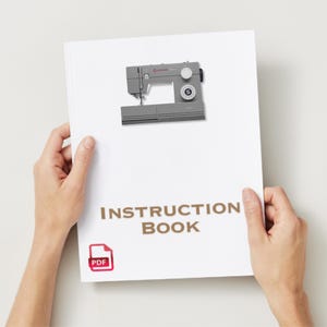 May include: A white instruction book with the text "INSTRUCTION BOOK" and a PDF icon. The cover features a grey Singer sewing machine.