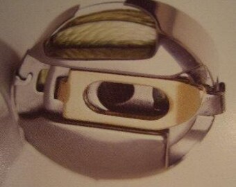 Pfaff Creative Bobbin Case Gold Latch – 9mm Zigzag Compatible for Reverse Embroidery on Select Creative, Expression & Tiptronic Models