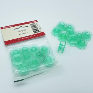 Genuine Green Husqvarna Bobbins 10 Pack – “H” Logo Spools for Designer, Opal, Sapphire, Lily, Topaz, Brilliance, Scandinavia Series