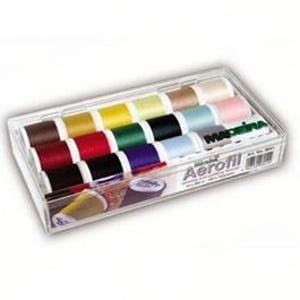 May include: A clear plastic box containing 12 spools of thread in various colours, including brown, yellow, red, green, black, blue, and pink. The spools are labelled "Aerofil" and "Made in Italy".