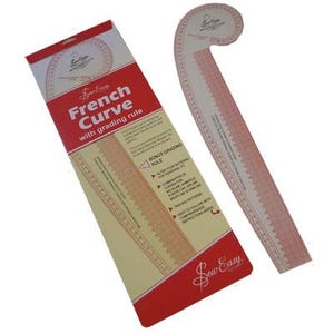 May include: A French curve and grading rule set. The packaging is red and cream-coloured with the text "French Curve with grading rule." The curve is a light pink colour with measurement markings. The set is for sewing and pattern making.