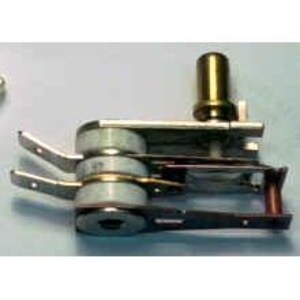 May include: A silver thermostat with a cylindrical brass fitting and two stacked, circular components. The device has several metal tabs and a small, copper-coloured rod. The background is a light blue-grey.