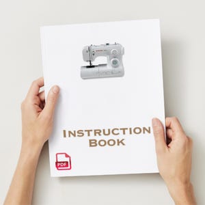 May include: A white instruction manual for a Singer sewing machine. The manual has the text "INSTRUCTION BOOK" and a PDF icon.