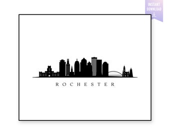 May include: Black and white silhouette of the Rochester, New York skyline. The skyline features several tall buildings, a bridge, and a church.
