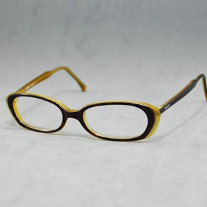 00s Vintage acetate eyeglasses Donna Karan New York DKNY 6806 244 Italy NOS Unworn small catete woman oval honey ivory carrey mod design
