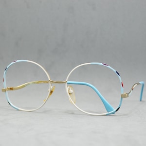 Lunettes de vue oversize vintage en métal pour femme des années 80 et 90, Nouvelle Ligne Fantasy II, non portées. Papillon. Arrondi. Blanc bleu clair doré coloré