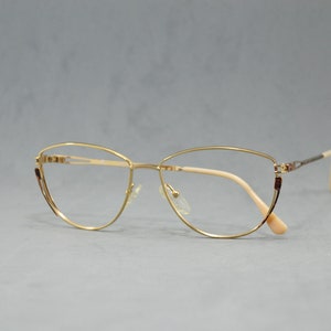 Vintage metal woman EyeGlasses CARLA CIRELLA  Unworn. Classic woman oval drop red marbled brown gold Rx eyewear 90s NOS ols stock fashion