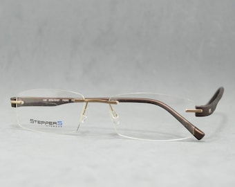 STEPPERS EYEWEAR 70127 FS260 Vintage rimless EyeGlasses NOS Unworn Classic square narrow rectangular Unisex man Woman 00s-10s Light brown