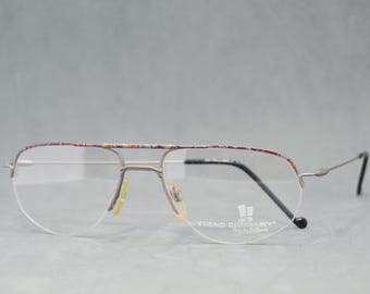 Vintage metal eyeglasses half rimless TREND COMPANY 970 00Ss.Unworn. NOS. Eyewear Unisex man woman aviator drop narrow. Dark silver colorful