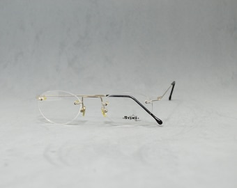 Vintage Rimless EyeGlasses STING NOS Unworn Classic round Unisex man Woman Rx eyewear 90s 00s Silver Black Flexible Stainless steal