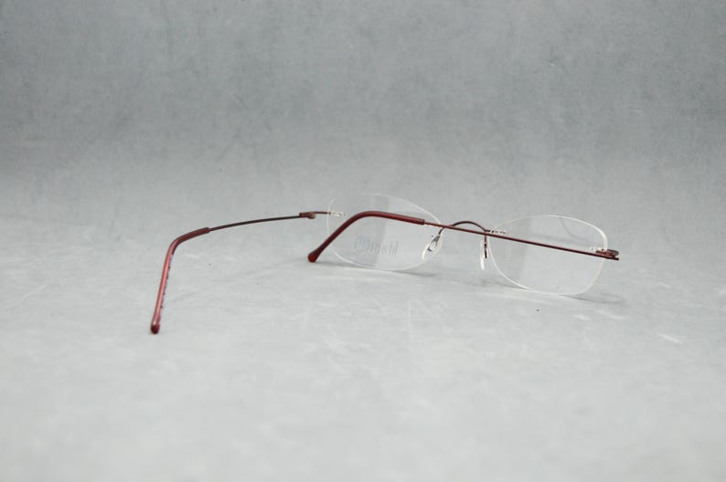 Rimless EyeGlasses TITANIUM 505 07. Dead Stock. Nos Unworn. Unisex Woman. 00s. Garnet. Small cateye. Regular size. 50 18 140 Spec Eyewear image 7