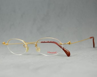 Vintage rimless EyeGlasses MENRAD by FMG NOS Unworn Classic rounded oval Unisex man Woman eyewear 90s 00s golden flexible Stainless steel