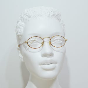 Vintage metal Eyeglasses 90s Rx Eyewear NOS Unworn Golden Carey round oval woman small faces and size cool old fashion steampunk