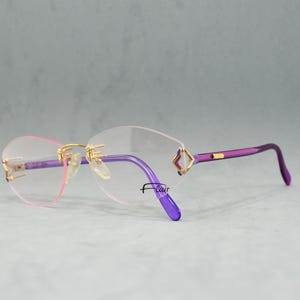 Top vintage lunettes sans monture FLAIR Fantasy NOS ovale papillon élégant classique Femme lunettes OOs chirurgical acier inoxydable doré violet