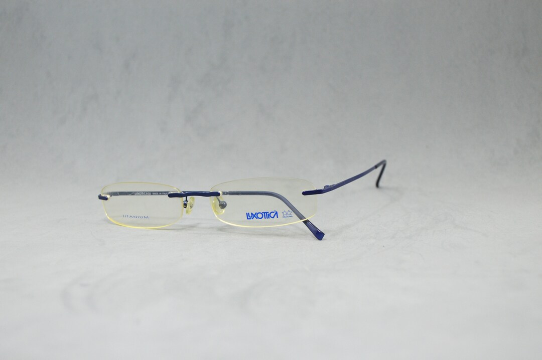 Vintage Titanium Rimless Eyeglasses LUXOTTICA Nos Unworn