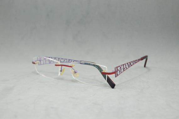 Vintage Rimless EyeGlasses OXYGEN 1081 by Von Bogen Germany NOS hexagon Woman eyewear 00S Top Stainless steal orange red purple Fantasy arms