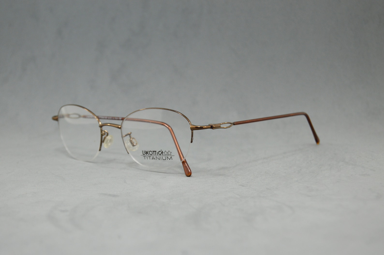 Vintage Eyeglasses LUXOTTICA Titanium NOS Unworn Classic Regular Size ...