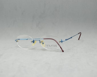 Silhouette‎ Vintage Oval Eyeglasses Frames Silver Tone Metal Austria 22430 Silhouette Titanium Silver Tan Oval Rimless Eyeglasses  main image 2