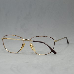 Vintage metal woman EyeGlasses XAFFER Unworn. Classic woman butterfly drop marbled dark brown gold Rx eyewear Spain 90s NOS old fashion