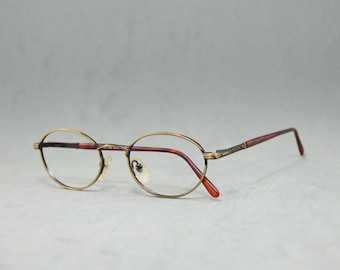 Vintage metal Eyeglasses Röhm Classic 3010 Germany. NOS Unworn. Unisex,man, woman rounded oval Rx eyewear Spectacles old gold black brown