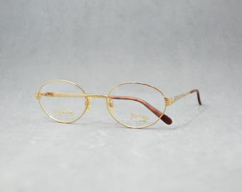 Titan by Metzler Eyeglasses Frames Sivler Gold Oval Full Rim  display picture 3