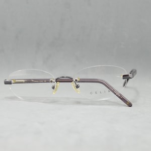 Top EyeGlasses Vintage CELINE 1020 Rimless NOS Unworn Italy Oval classic eyewear regular size Unisex Man Woman Gunmetal and light grey